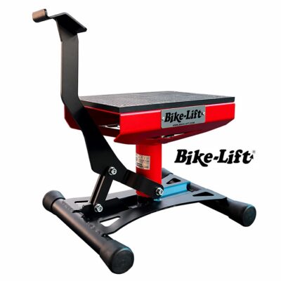 Caballete central con palanca Bike-Lift SKS-2012 para motos de supermotard elevando el chasis en taller profesional.